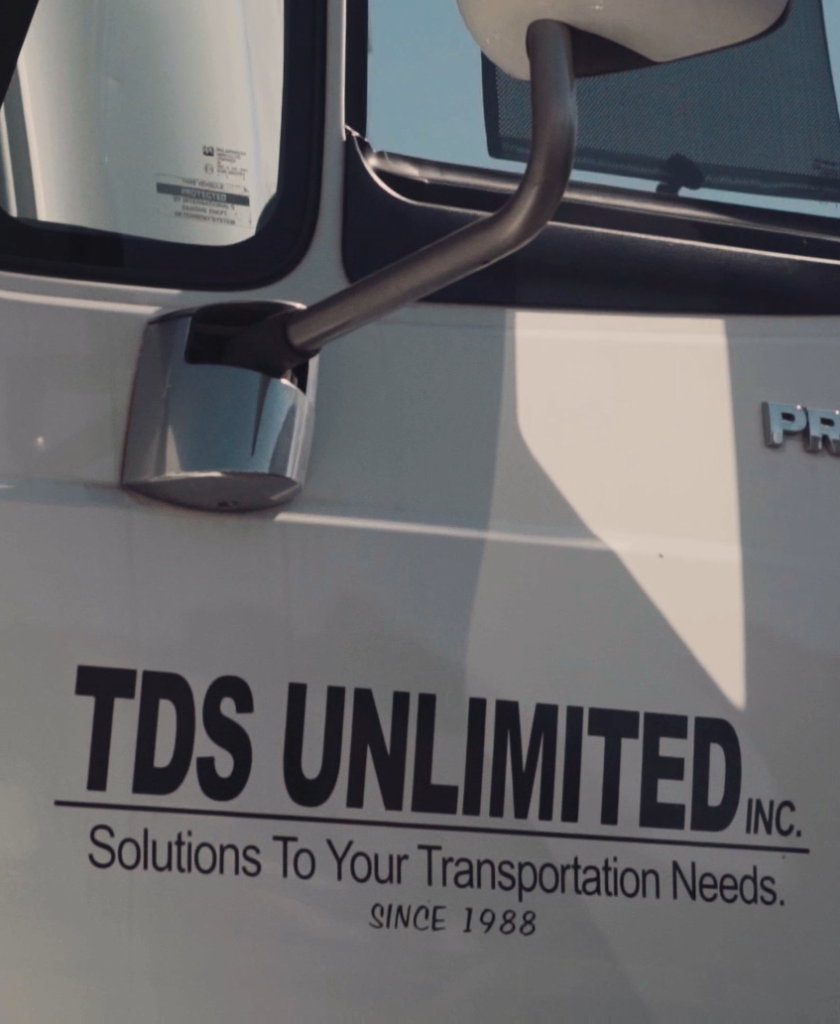 TDS Unlimited, logo on truck